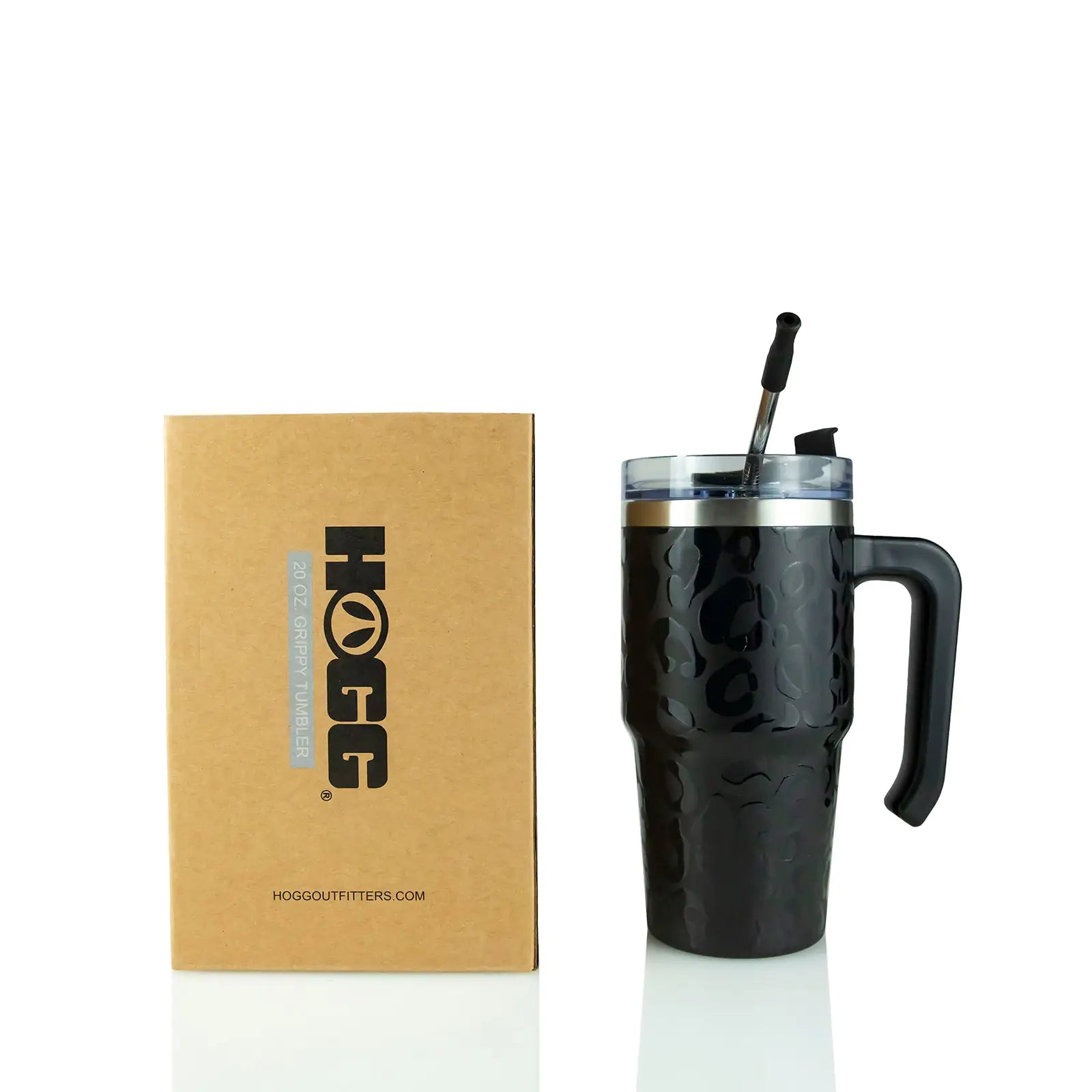Black travel mug with handle and straw, next to a brown box with 'Hogue' branding on a white background.